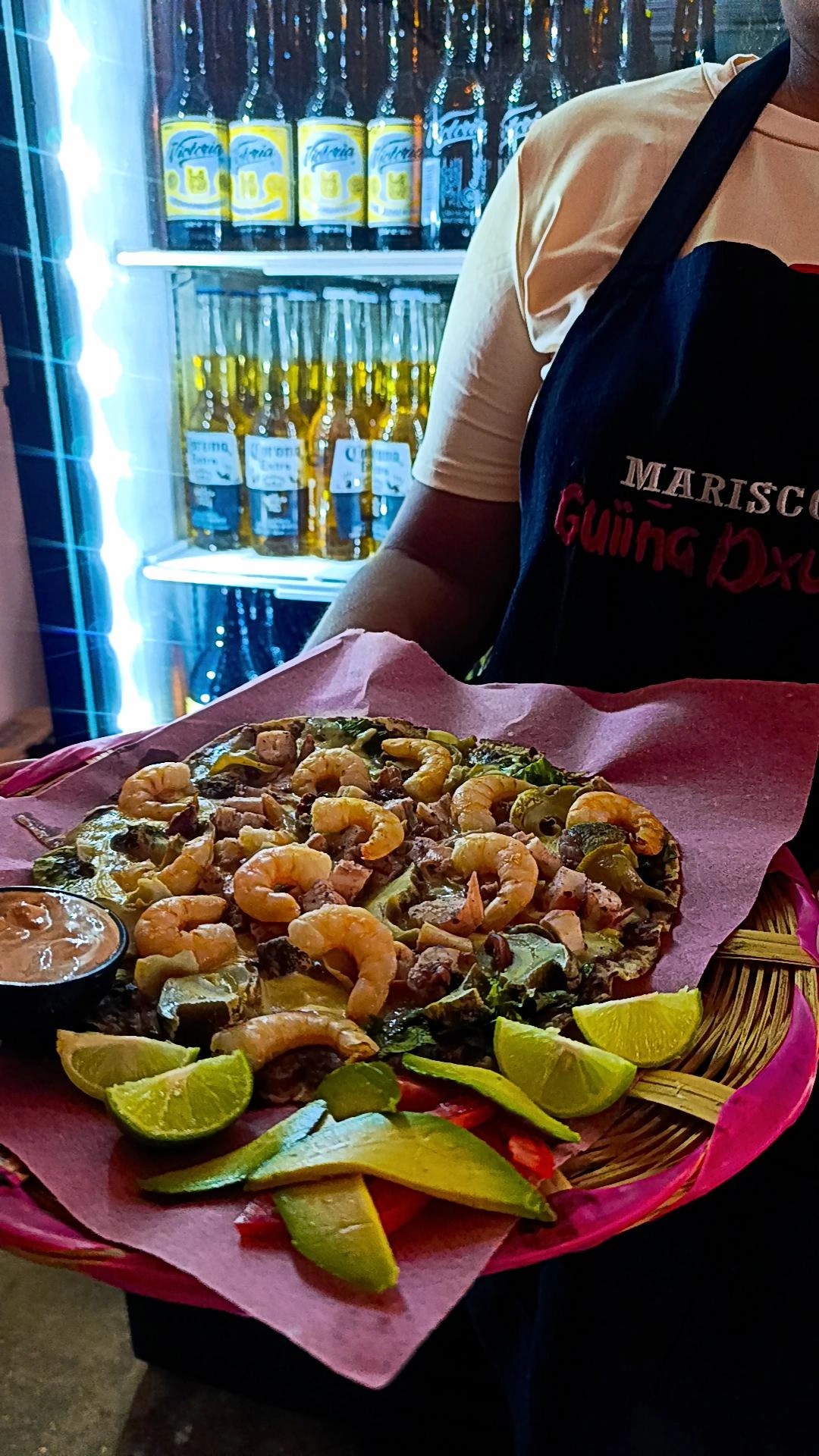 Tlayudas con mariscos. Foto: Mariscos Guiiña Dxuladi