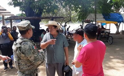 Migrantes cruzan el río Suchiate y desafían a la Marina