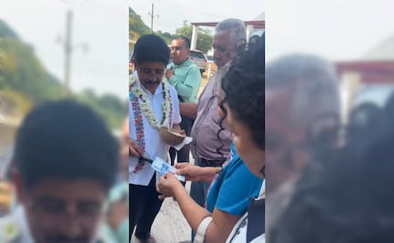 Hugo Aguilar regala mil pesos a mujer en Oaxaca; revisa cumplimiento de sentencia para descontaminar Río Santo Domingo