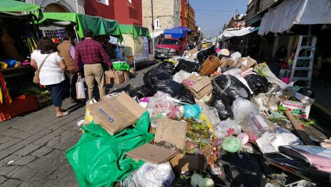 Capital de Oaxaca se llena de basura por paro de trabajadores
