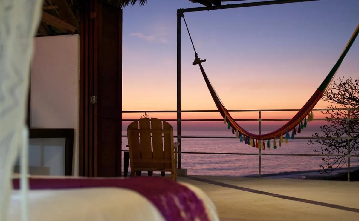 Cabañas tropicales frente a las playas de Oaxaca. Foto: Casa Mermejita