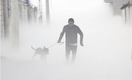 Regresa a rescatar a su perro en medio de la nube de gas en Puebla