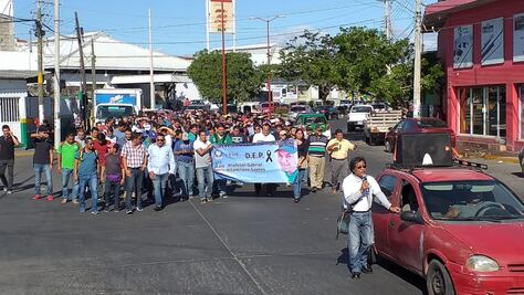 Marchan maestros de educación física; piden justicia por profesor asesinado