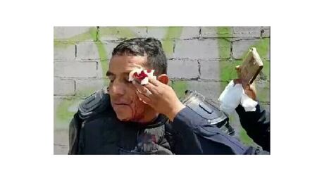 En gresca, militantes de CNPA lesionan a un policía oaxaqueño