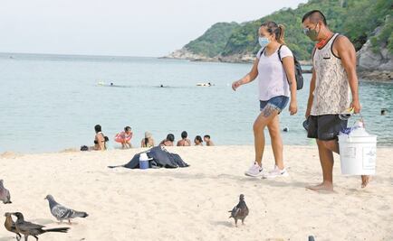 Ante aumento de Covid-19, Huatulco entra a semáforo naranja; playas operan al 60% con horario restringido