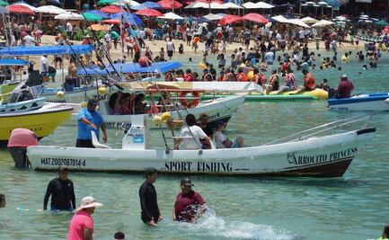 FOTOS. Regios, tapatíos y hasta neoyorquinos abarrotan playas de Huatulco en Semana Santa