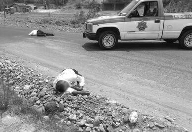 Matan a dos policías viales, entre ellos una mujer, y a una empresaria