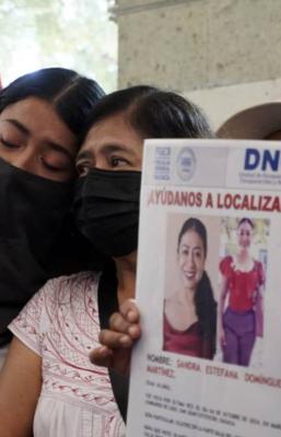 Con marcha, exigen al gobierno de Oaxaca presentaci&oacute;n con vida de la activista Sandra Dom&iacute;nguez