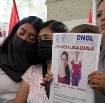 Con marcha, exigen al gobierno de Oaxaca presentaci&oacute;n con vida de la activista Sandra Dom&iacute;nguez