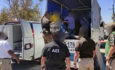 Rescatan a 20 migrantes en San Sebastián Tutla; detienen a dos hombres que los transportaban 