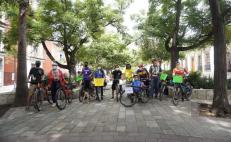 'Ruedan' ciclistas y vecinos contra obra de Símbolos Patrios, Oaxaca; pintan mural contra 'ecocidio'