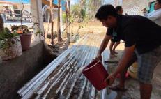 Sin agua potable por destrucción de sus 4 pozos, Zipolite resiste estragos de Agatha en Oaxaca