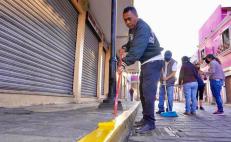 Con tequio, 200 funcionarios y ciudadanos mejoran imagen de 5 calles del Centro de Oaxaca