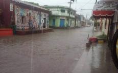 Fuertes lluvias por onda tropical 9 dejan daños e inundaciones en dos regiones de Oaxaca