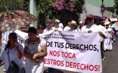 Marchan en Oaxaca trabajadores del Poder Judicial contra la desaparición de fideicomisos