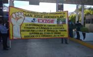 Triquis de Xochixtl&aacute;n, de la Mixteca de Oaxaca, bloquean caseta de Huitzo; exigen entrega recursos