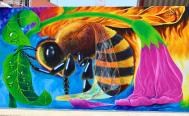 Con murales crean conciencia sobre las abejas y el uso del agua, en Putla, Oaxaca